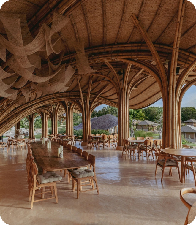 Inside the Shell Restaurant, structural bamboo arching over the dining tables toward open sides